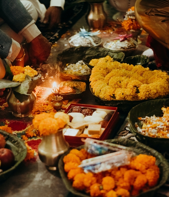 Festive offerings with marigolds and lamps